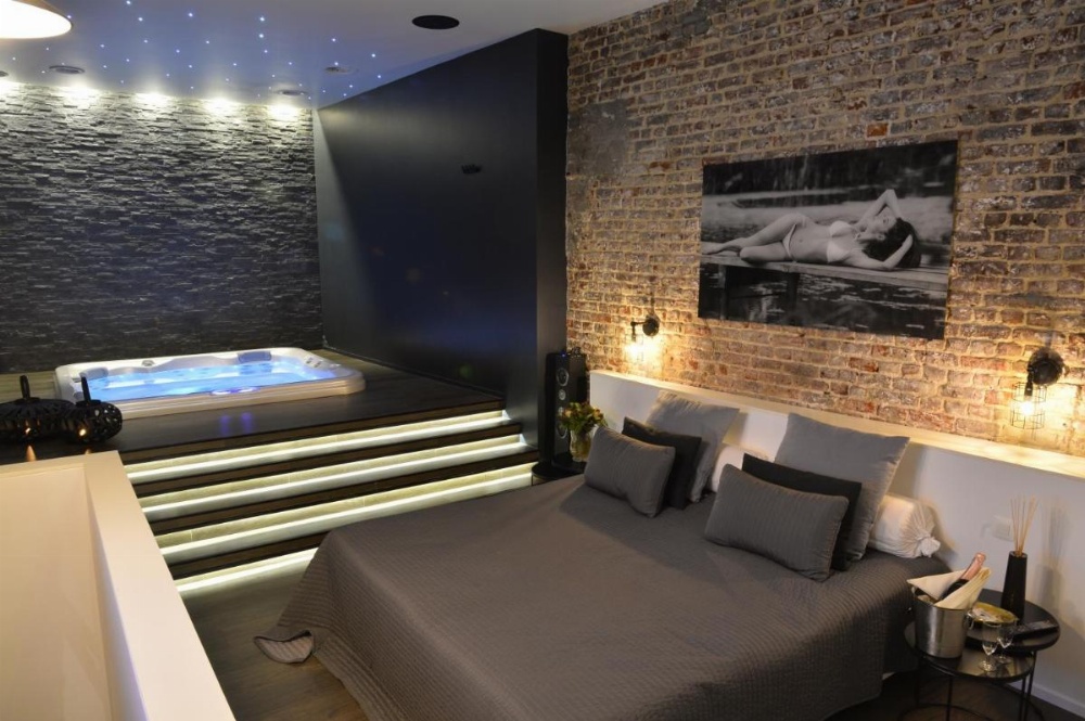 chambre avec jacuzzi sauna privatif Image 6